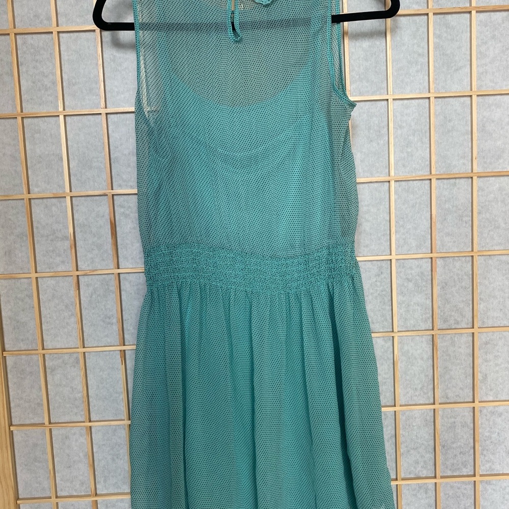 Zara dress light green colored.